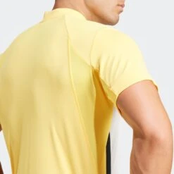 ADIDAS Freelift Pro Tennis Polo -Sporting Goods Store IS8969 8 APPAREL OnModel DetailView1 grey